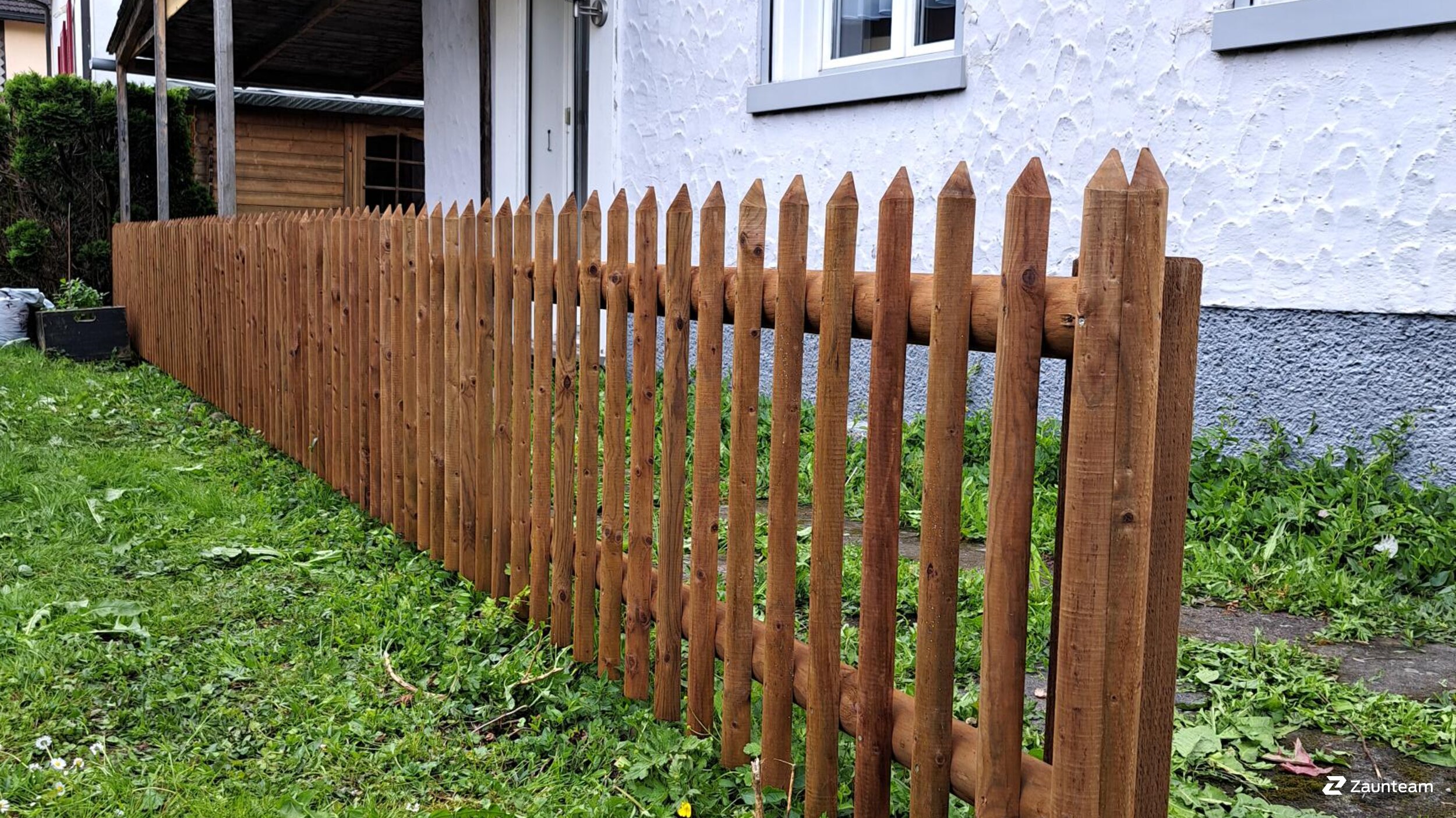Palisadenzaun aus dem 2025 in 9470 Buchs Schweiz von Zaunteam Werdenberg.