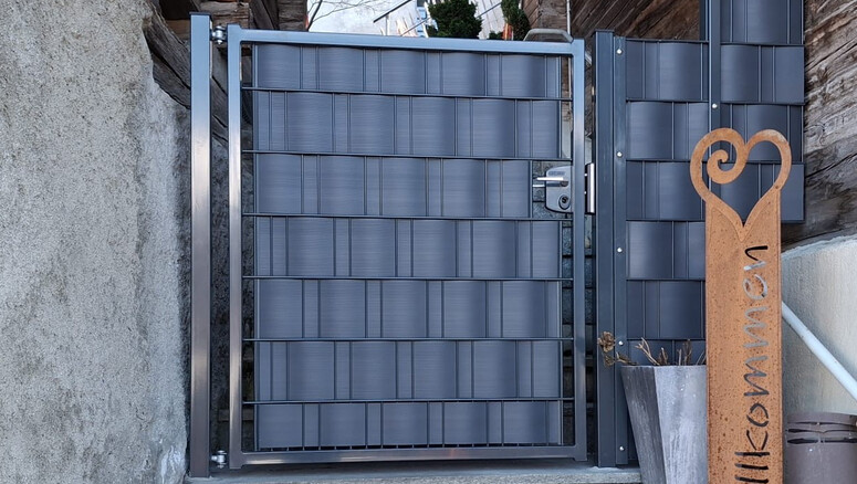 Protection brise-vue en tressage de 2026 à 3911 Ried-Brig Suisse de Zaunteam Wallis / Swissclôture Valais.