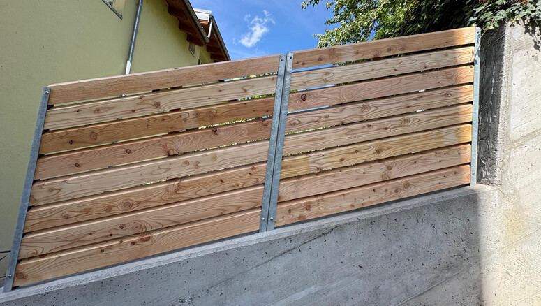Protection brise-vue en bois de 2026 à 3930 Visp Suisse de Zaunteam Wallis / Swissclôture Valais.