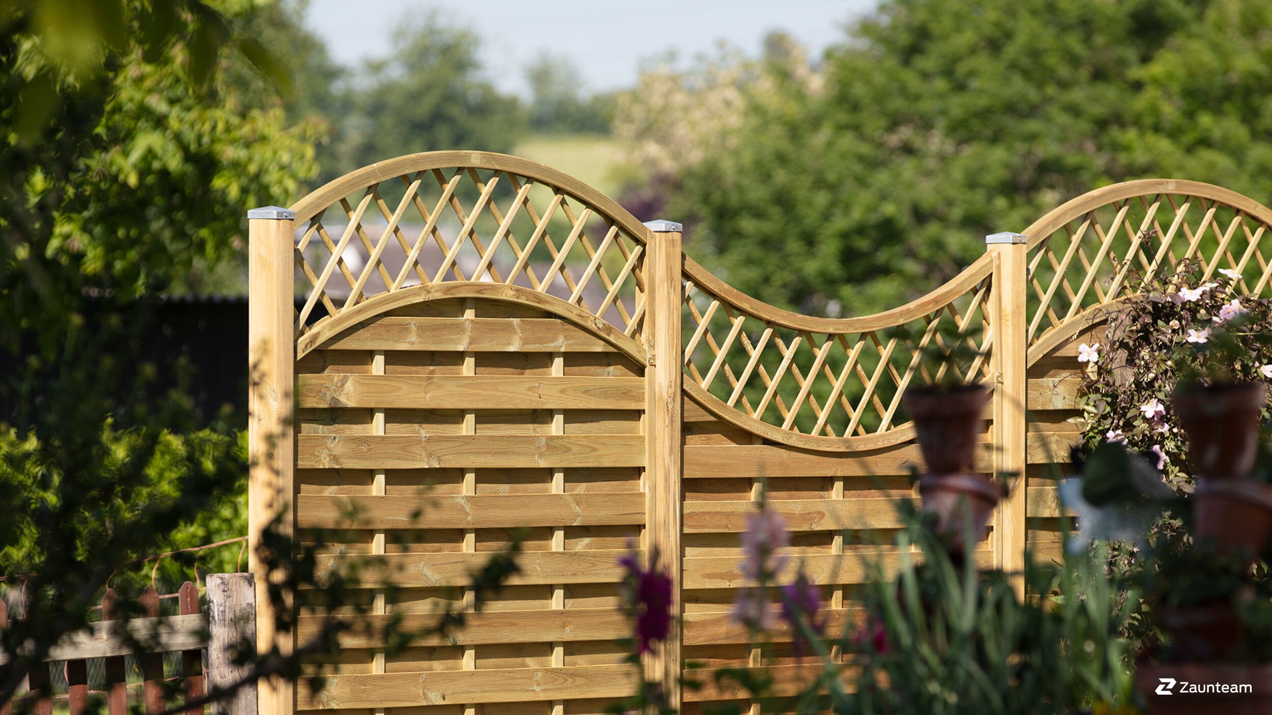 Dicht- und Lamellenzaun aus Holz | © Zaunteam